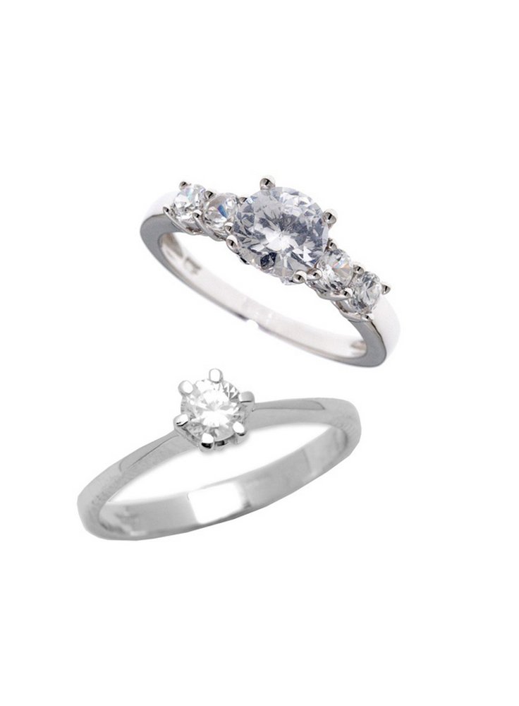 Anello con brillantino o trilogi - omaggio con 100 euro di spesa